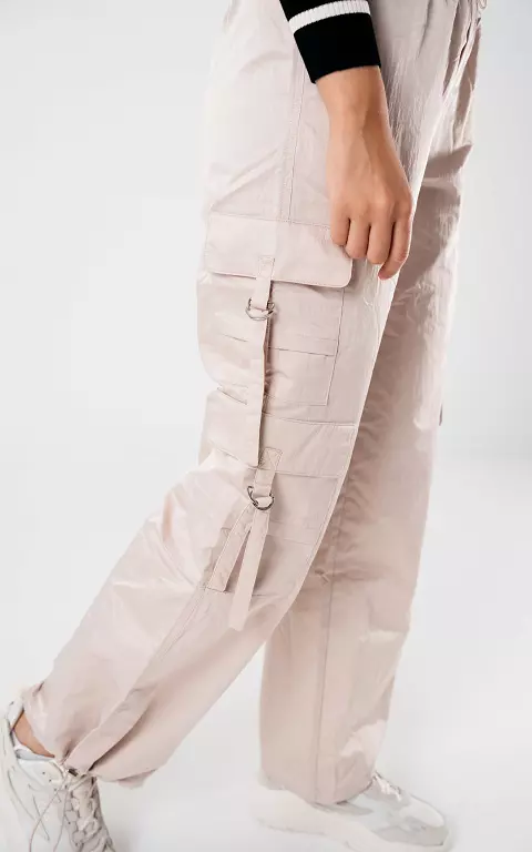 Parachute pants with silver-coloured details 