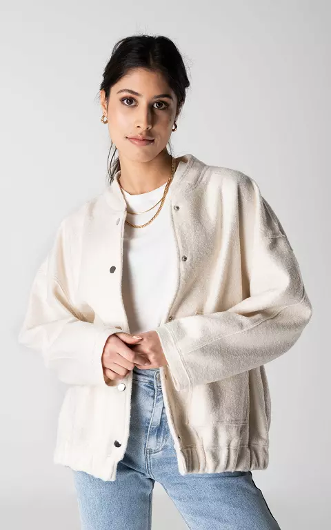 Oversized coat with press buttons cream