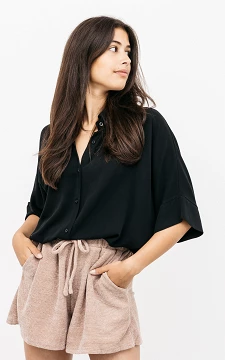 Oversized blouse met knopen | zwart | Guts & Gusto