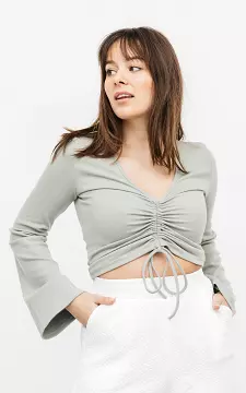 V-neck top with flared sleeves | light green | Guts & Gusto