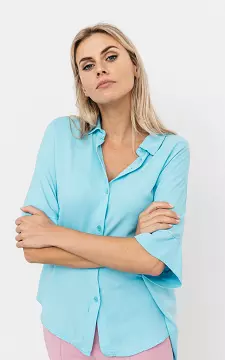 Oversized blouse met knopen | Lichtblauw | Guts & Gusto