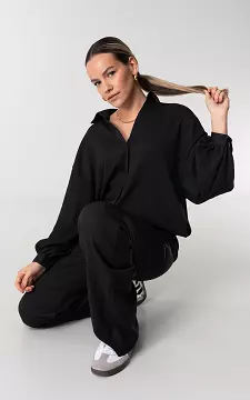 Oversized blouse with buttons | Black | Guts & Gusto
