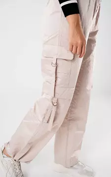 Parachute pants with silver-coloured details | Beige | Guts & Gusto