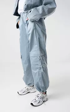 Parachute pants with silver-coloured details | Light Blue | Guts & Gusto
